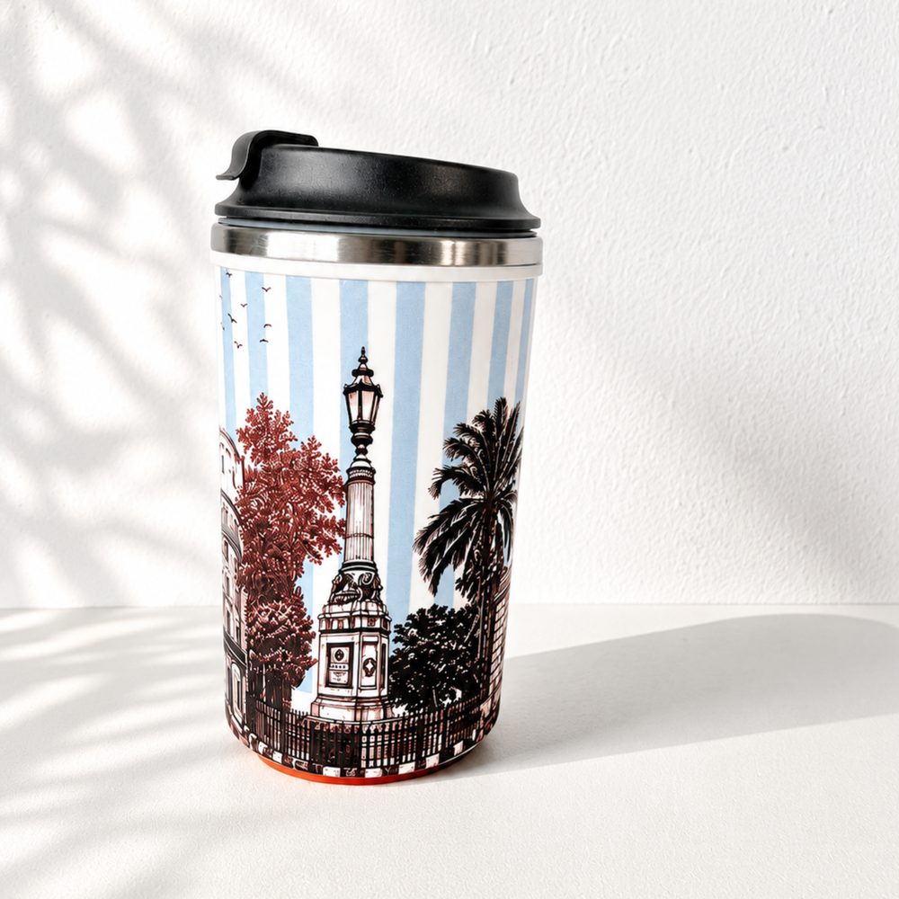 The Lamp and Palm Mug, a powder-blue striped vacuum insulated travel mug with a burgundy street lamp and palm illustration